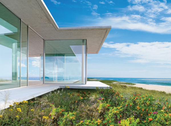 Villa dengan dinding kaca yang memaksimalkan pemandangan alam